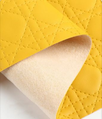 Waterdicht kunstmatig pvc-leer voor zakken geborduurd plaid geweven patroon